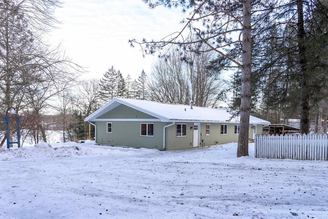 view of snow covered property