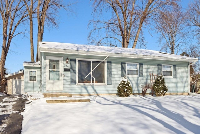 view of front of property featuring a garage