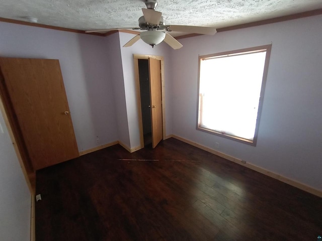 33315 State Highway 13, Bayfield, WI 54814 - unfurnished bedroom featuring wood finished floors, a textured ceiling, ceiling fan, and a closet