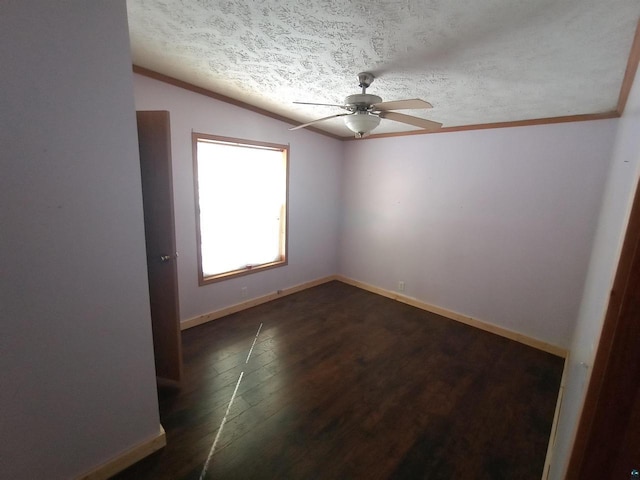 33315 State Highway 13, Bayfield, WI 54814 - empty room featuring ornamental molding, ceiling fan, dark wood-type flooring, a textured ceiling, and lofted ceiling