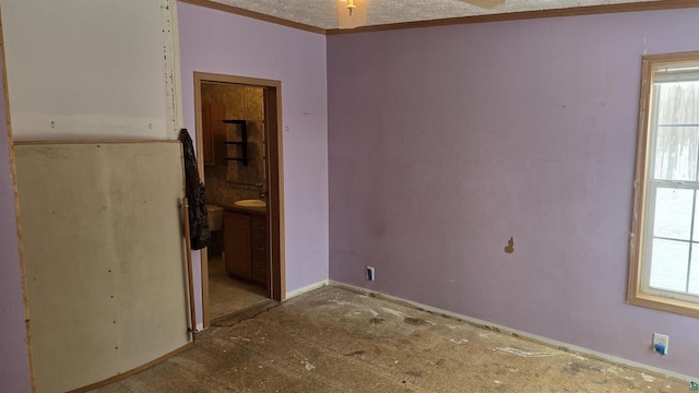 33315 State Highway 13, Bayfield, WI 54814 - spare room featuring baseboards and crown molding