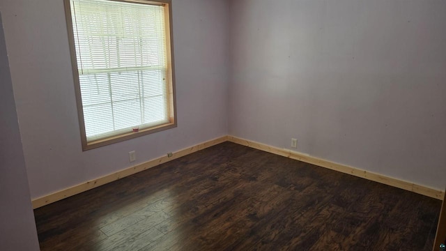 33315 State Highway 13, Bayfield, WI 54814 - spare room featuring dark wood-type flooring
