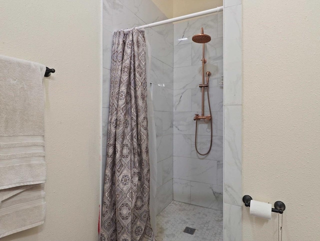 bathroom with a shower with shower curtain