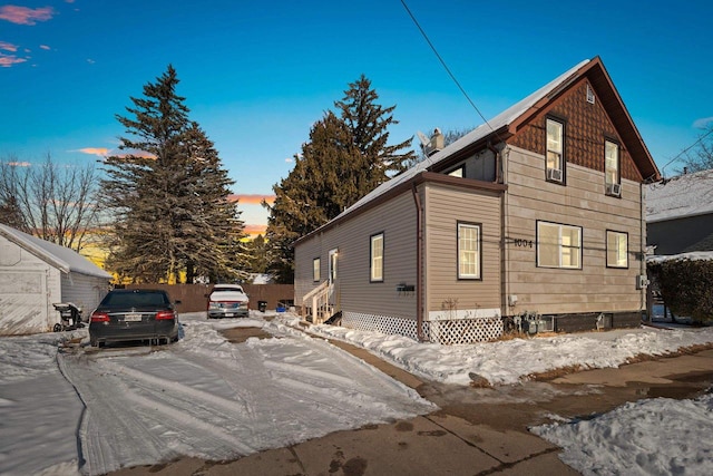 view of property exterior at dusk