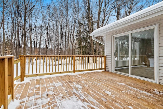 view of snow covered deck