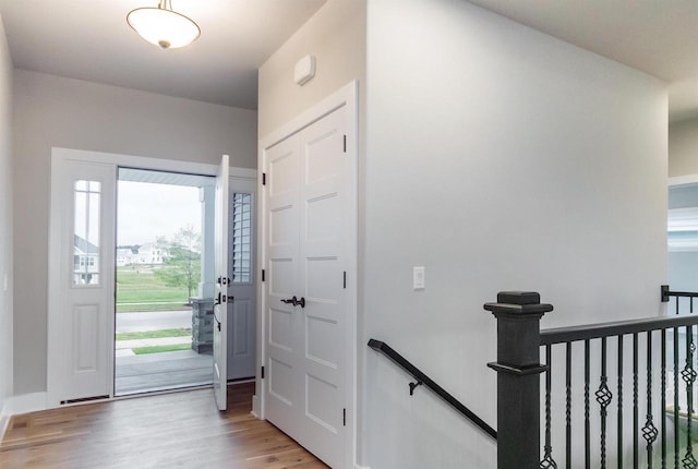 foyer with light wood-type flooring