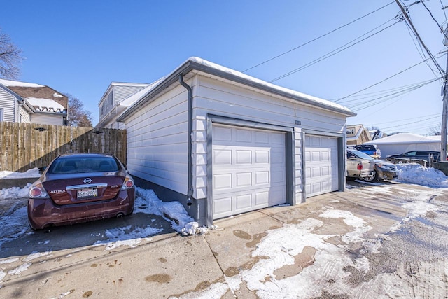 detached garage with fence