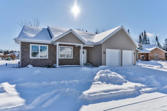 view of front of property featuring a garage