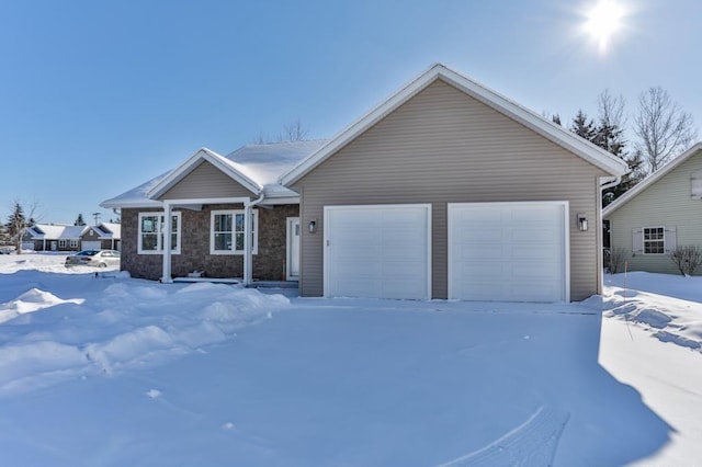 ranch-style home with a garage