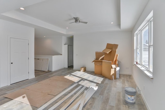 interior space with light hardwood / wood-style floors and ceiling fan