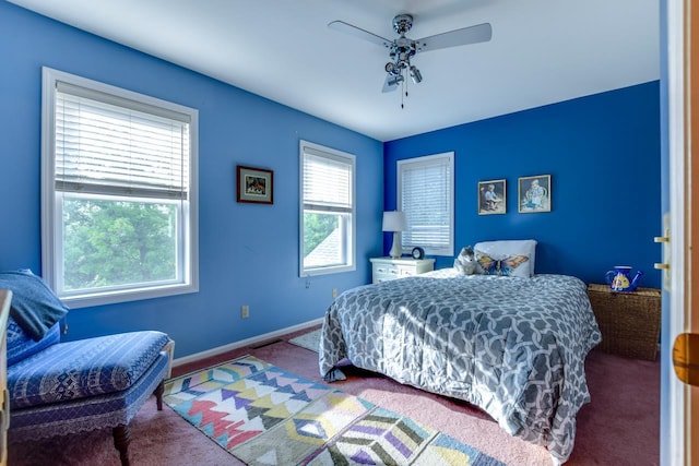 bedroom with ceiling fan and carpet flooring