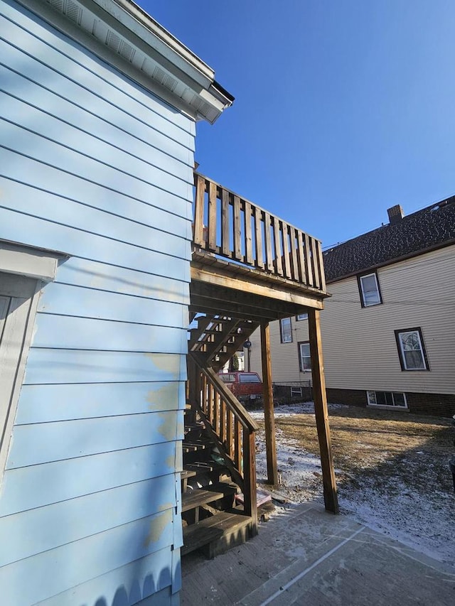 exterior space featuring a wooden deck