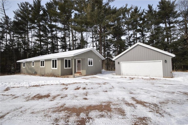 view of snow covered garage