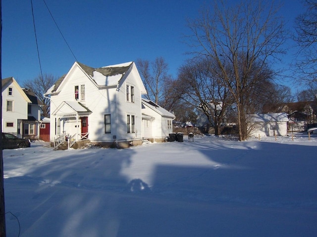 view of snow covered property