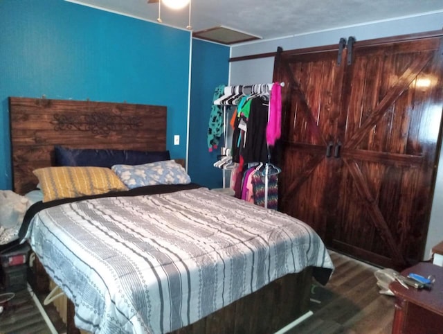 bedroom featuring wood finished floors