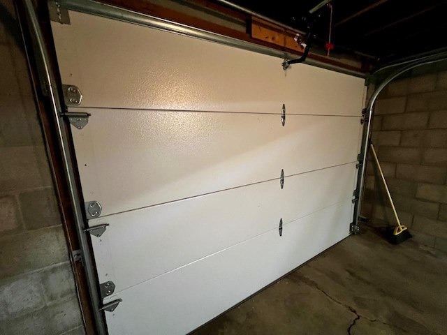 garage featuring concrete block wall