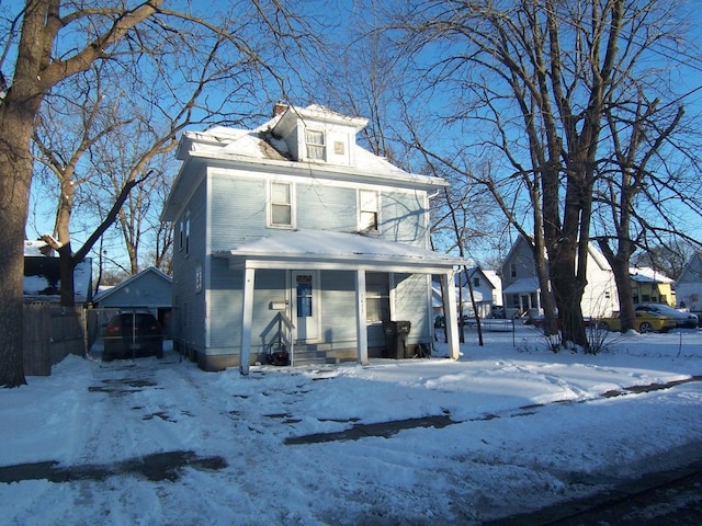 view of front property featuring covered porch