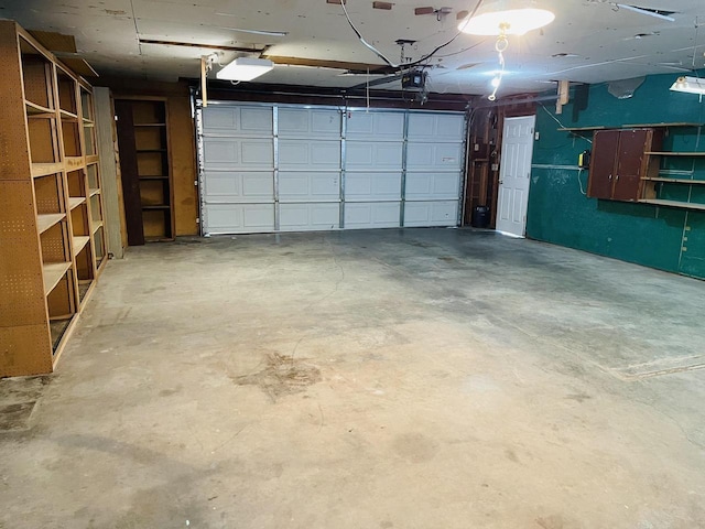 W7679 Oak St, Shiocton, WI 54170 - garage featuring a garage door opener