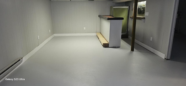 basement with a baseboard radiator