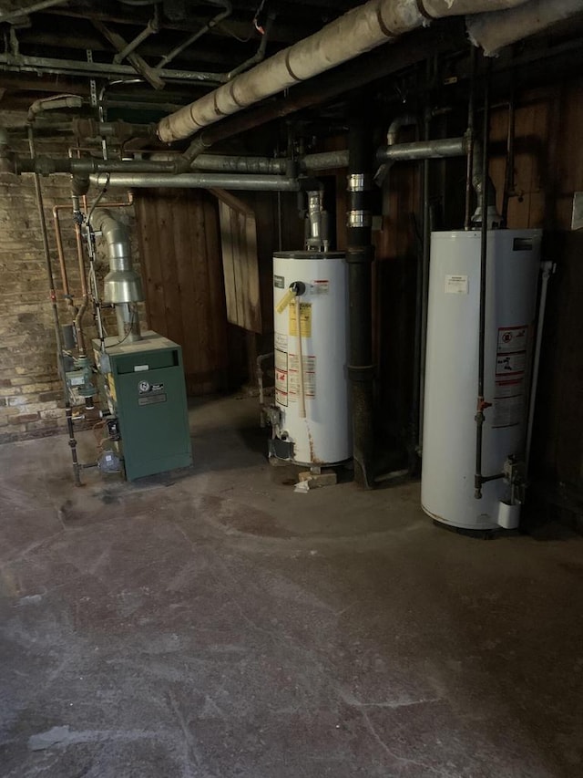 utility room featuring gas water heater