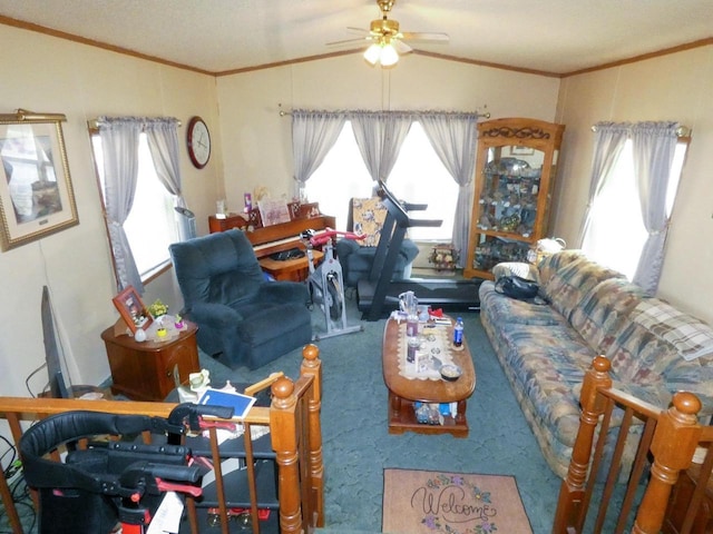 living room with vaulted ceiling, ornamental molding, ceiling fan, and carpet flooring