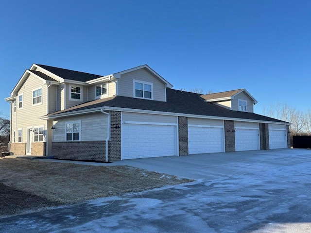 view of property exterior with a garage