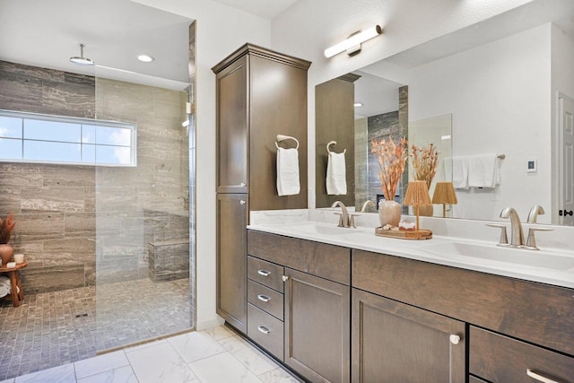 1452 Serenity Ct, Sun Prairie, WI 53590 - bathroom featuring a sink, a walk in shower, double vanity, and marble finish floor