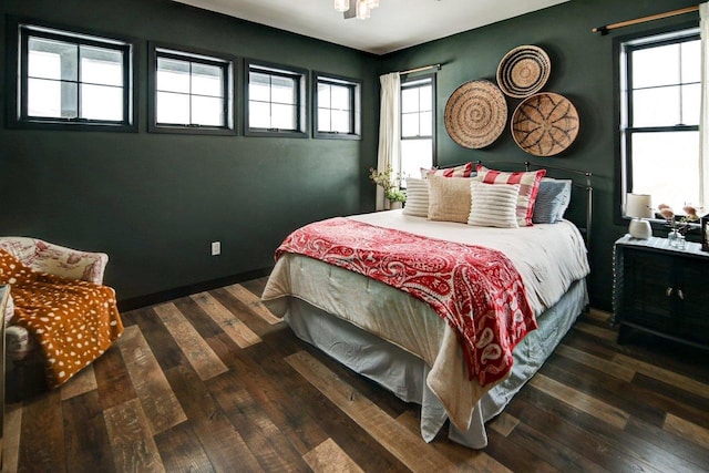 bedroom featuring wood-type flooring