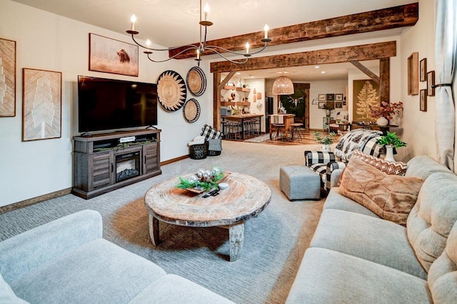 living room with carpet, beam ceiling, and baseboards