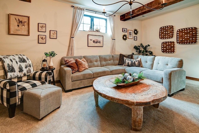 living area featuring baseboards and light colored carpet