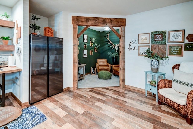 living area with light wood finished floors