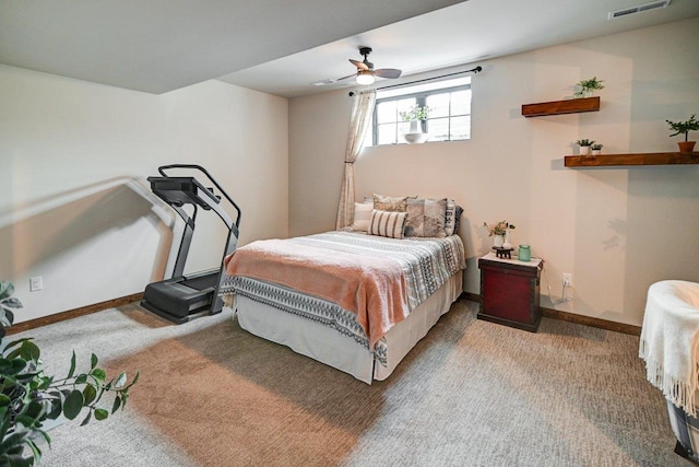 carpeted bedroom with a ceiling fan, visible vents, and baseboards