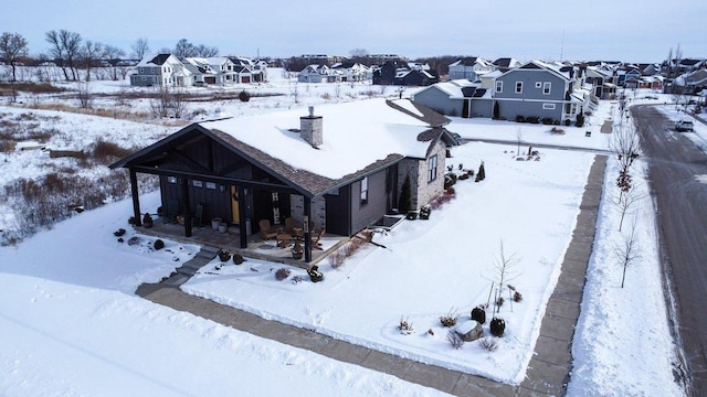 birds eye view of property with a residential view