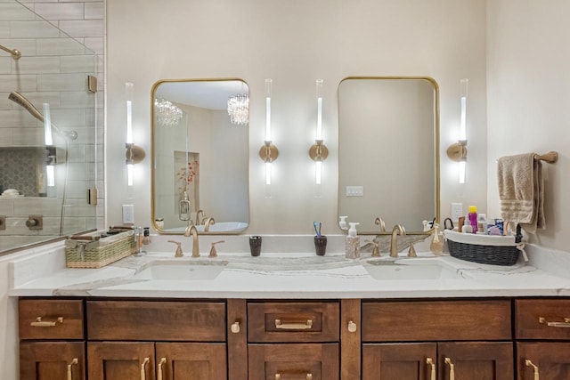 bathroom with walk in shower and vanity