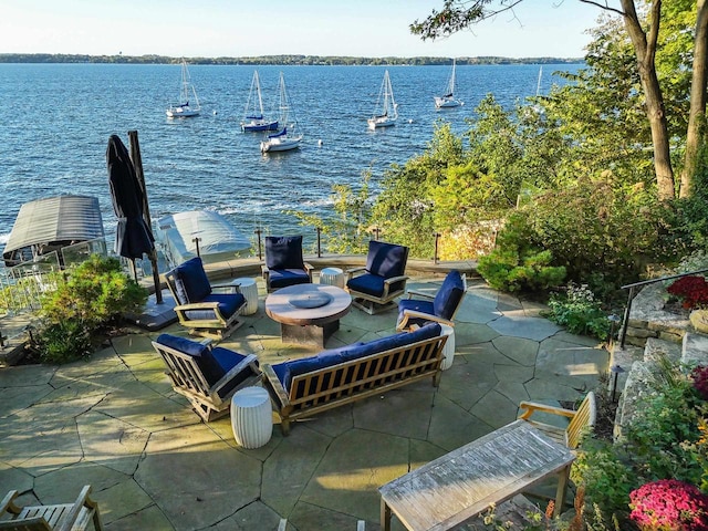 view of patio / terrace with a water view