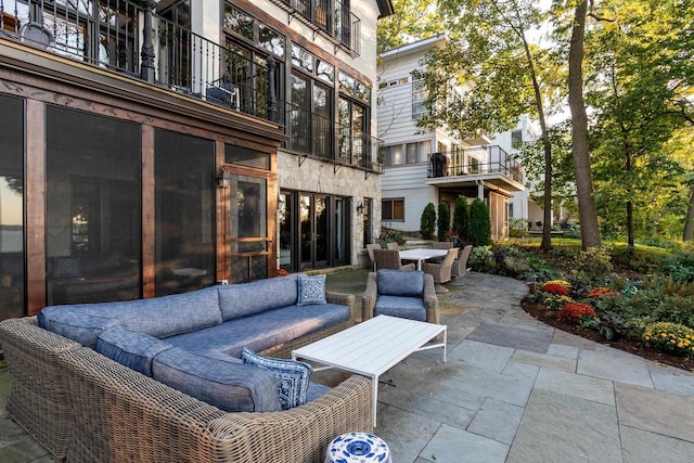 view of patio / terrace featuring an outdoor hangout area and outdoor dining area