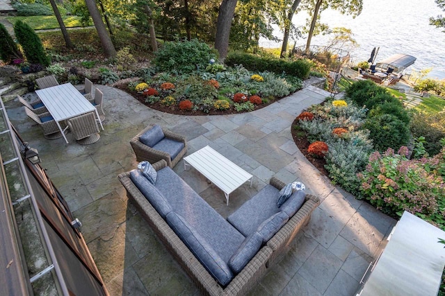 view of patio featuring outdoor dining space and an outdoor hangout area