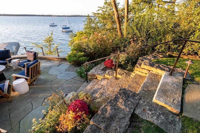 view of patio / terrace featuring a water view