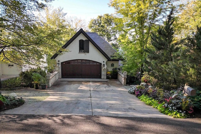 garage featuring driveway