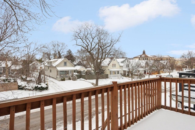 view of snow covered deck