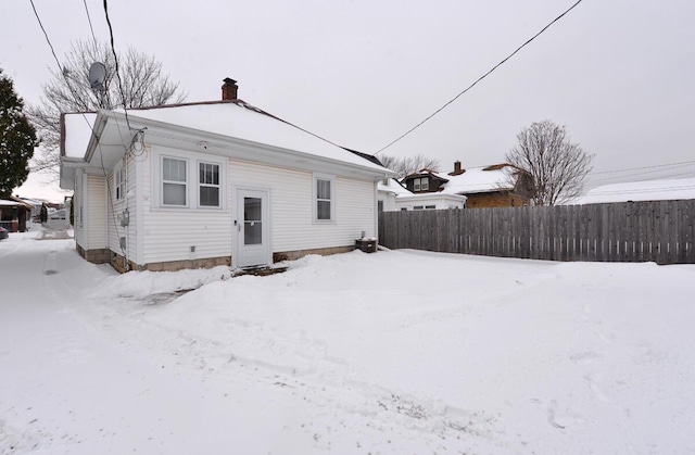 view of snow covered property