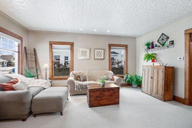 living room featuring light carpet and crown molding