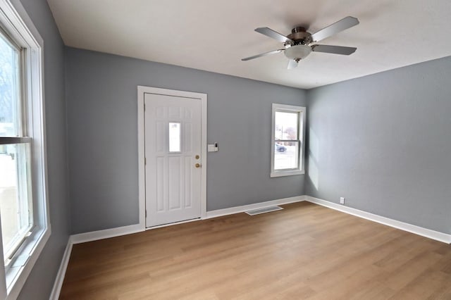 entrance foyer featuring ceiling fan and light hardwood / wood-style floors