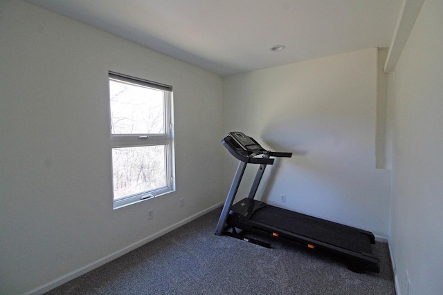 exercise room featuring carpet flooring and baseboards