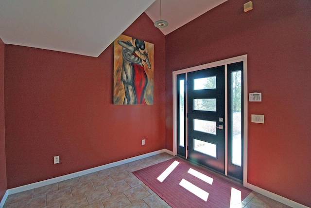 foyer featuring baseboards