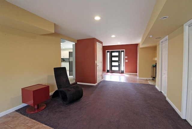 entrance foyer with tile patterned floors, recessed lighting, baseboards, and carpet floors