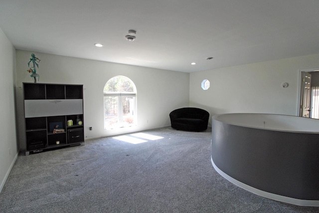 interior space with recessed lighting, baseboards, and carpet floors