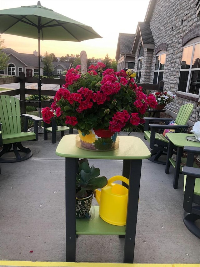 view of patio terrace at dusk