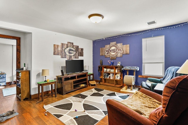 living room with wood-type flooring