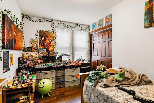 bedroom featuring dark hardwood / wood-style floors